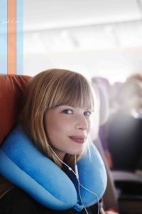 A neck pillow for sleeping on the plan may save your vacation!