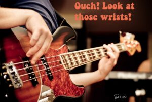 Ouch! Those wrists are going to see some carpal tunnel pain! Bass player injuries can be prevented. They can also be healed without drugs and surgery, at home, without frequent visits to providers. Call Dr. Lou, Maine's "Rock Doc." (207) 774-6251. Telemedicine available.
